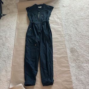 Anthropology Black jumpsuit with gold zipper, belted waist, and pockets